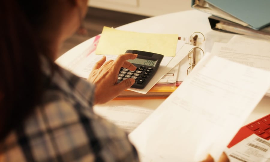 Person preparing to pay taxes 