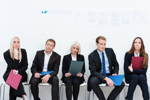 People waiting  in an office to be interviewed