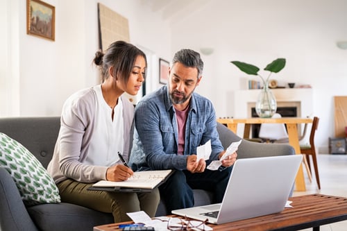 Adult couple working on finances